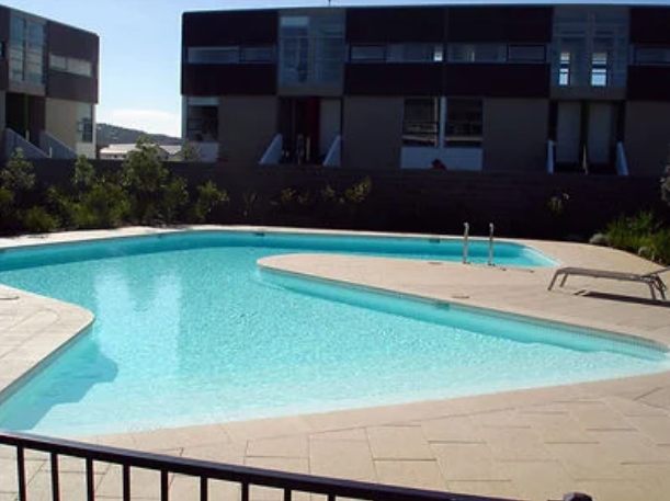 An apartment swimming pool, freshly finished